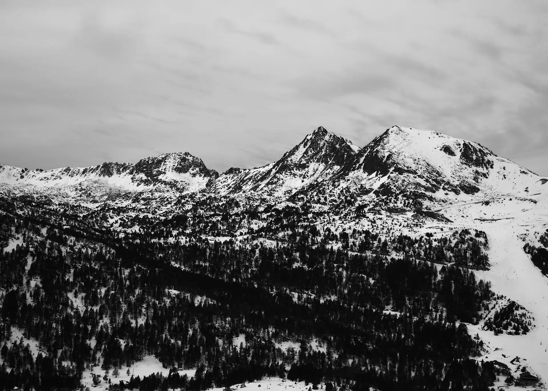 black and white mountain covered with snow