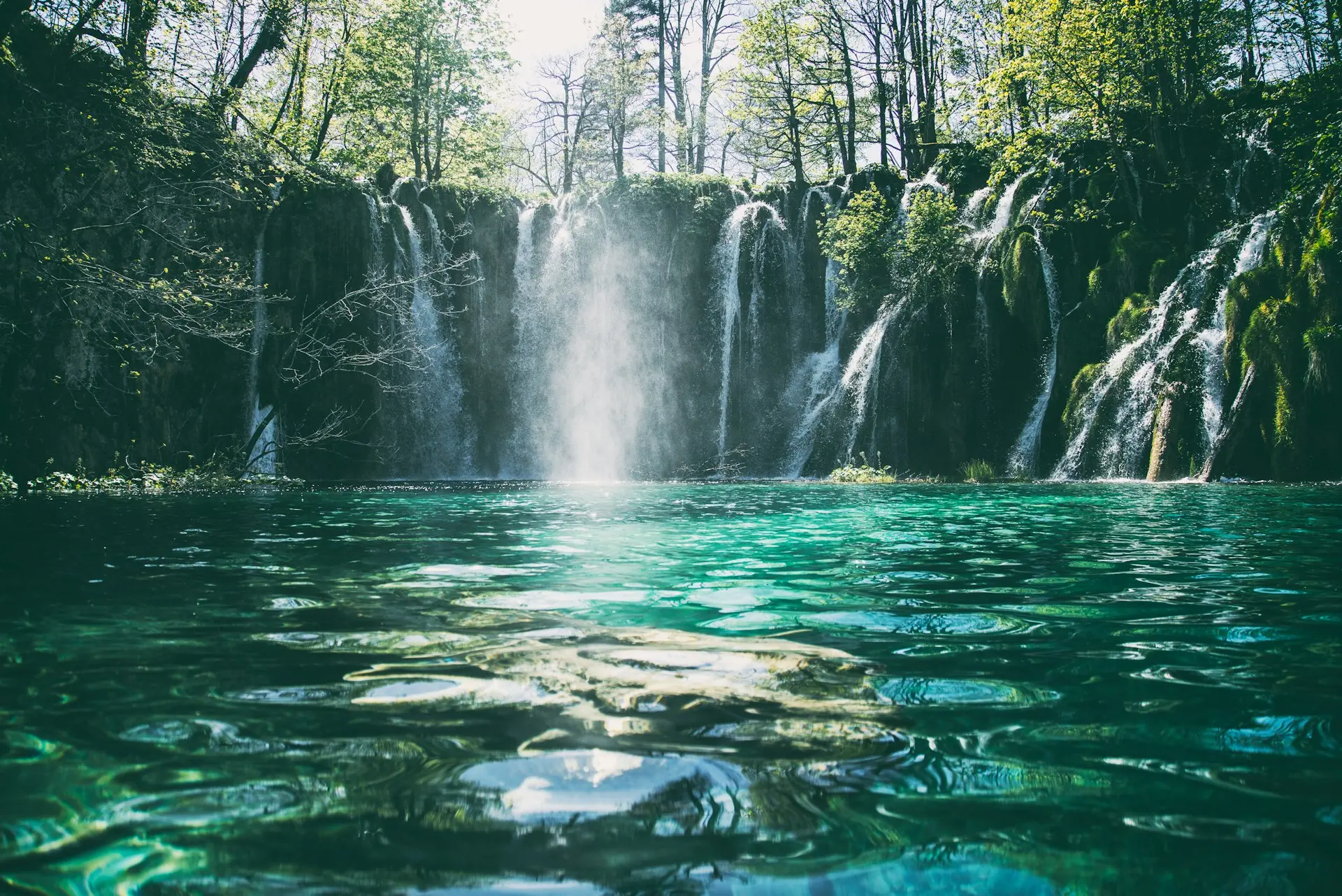 time-lapse photography of flowing multi-tier waterfall