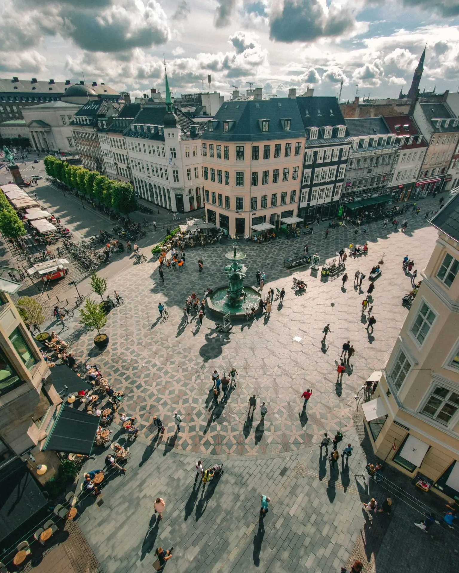 people walking on street near buildings during daytime